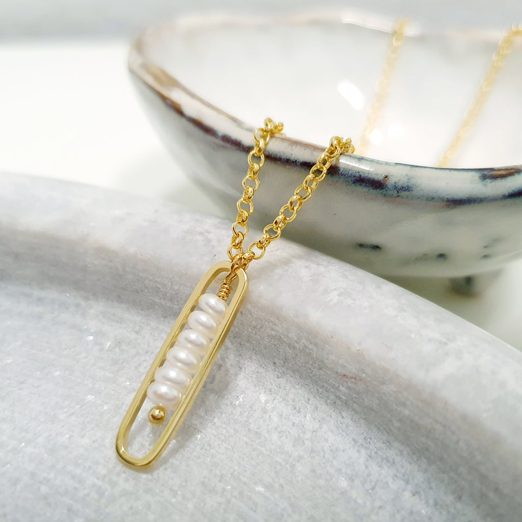Glamorous Pearls Collection Necklace - Enclosed Pearl Strand Vertical Necklace