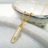 Glamorous Pearls Collection Necklace - Enclosed Pearl Strand Vertical Necklace