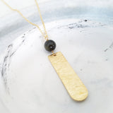 Helios Brass Collection - Gold Sheen Obsidian Round End Gold Bar Necklace